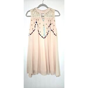 NWT women’s boho style dress by She +Sky. Size small
